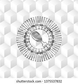 chicken leg icon inside grey badge with geometric cube white background