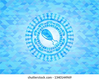 chicken leg icon inside light blue emblem with mosaic background
