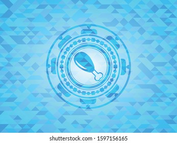 chicken leg icon inside light blue emblem with triangle mosaic background