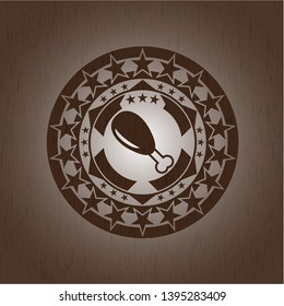 chicken leg icon inside realistic wood emblem