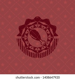 chicken leg icon inside red emblem
