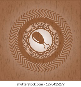 chicken leg icon inside retro style wood emblem