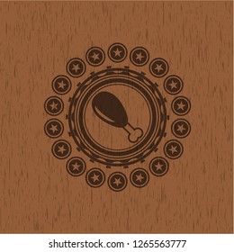 chicken leg icon inside wooden emblem. Vintage.