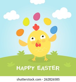 Chicken plays with easter eggs