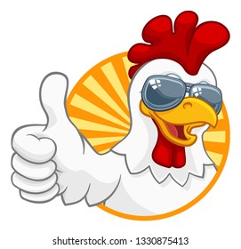 A chicken rooster cockerel bird cartoon character in cool shades or sunglasses giving a thumbs up