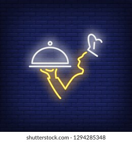 Chief cook holding serving tray neon sign. Cooking, catering service, restaurant advertising design. Night bright neon sign, colorful billboard, light banner. Vector illustration in neon style.