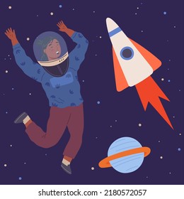 Child astronaut in cardboard or plastic rocket outfit dreams about space. Creative boy in self made costume imagines flying in sky. Kid playing space explorer. Guy in costume near huge rocket