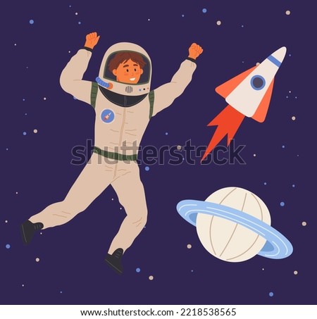 Child astronaut in cardboard or plastic rocket outfit dreams about space. Creative boy in self made costume imagines flying in sky. Kid playing space explorer. Guy in costume near huge rocket