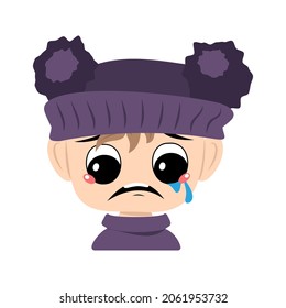 Child with crying and tears emotion, sad face, depressive eyes in violet hat with pom pom. Head of toddler with melancholy expression