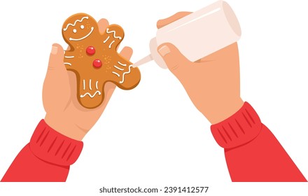 Child decorating gingerbread cookies. Kid's hands with traditional Christmas biscuits