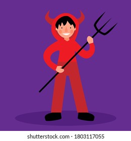 A child in a devil costume. Children costumes for Halloween. A boy in a red suit stands with a trident.