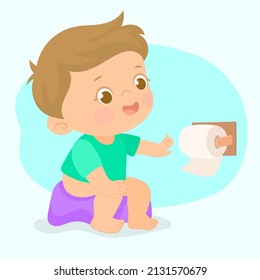 Child doing potty training. Baby boy sitting on the potty with toilet paper.