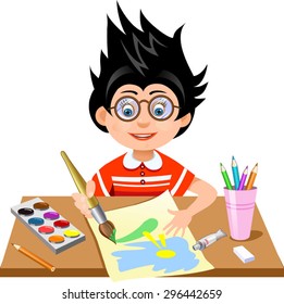 child drawing with brush in album using a lot of painting tools.