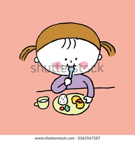 Child eating alone with a spoon