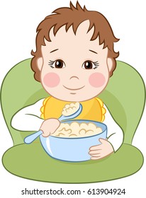 The child is eating with a spoon
