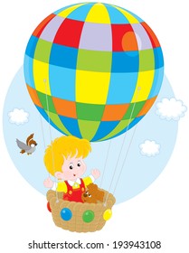 Child flying on a balloon