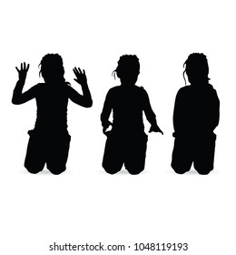 child girl kneels silhouette on white background