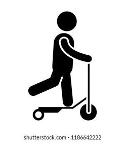 A child is going on a bicycle type vehicle denoting toddler scooter 