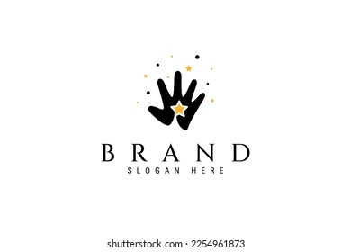 Child hand logo design with star depicting reaching a dream