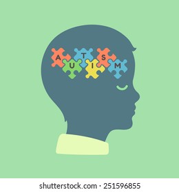 child head profile silhouette with jigsaw puzzle symbolizing autism spectrum disorders