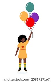 Child holding colorful balloons in a cheerful outdoor setting during the day