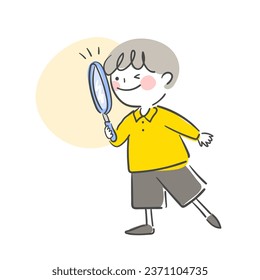 A child holding a magnifying glass