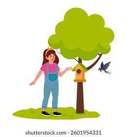 Child interacts with birdhouse under a tree in a sunny garden setting