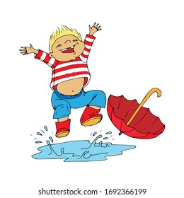 child jumping in a puddle with an umbrella