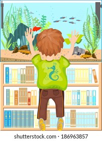 Child looking at an aquarium with marine fishes