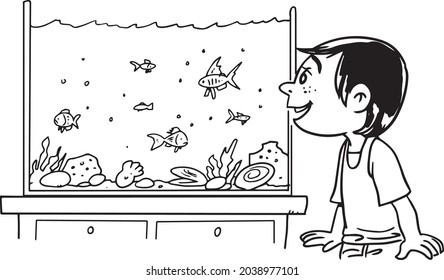 a child observes fish in an aquarium 