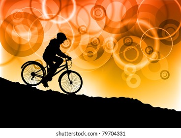 child on the bike by sunset