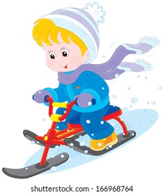 Child on a snow scooter