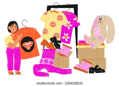 Child Packing Used Clothing And Footwear For Donation And Charity Event, Flat Vector Illustration Isolated On Background. Child Donating Old Clothing, Footwear And Toys. Garage Sale, Donation.