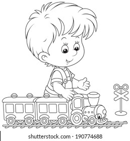 Child playing with a train