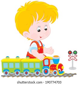 Child playing with a train