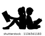 The child is reading a book.