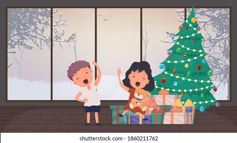 The child rejoices at the gifts under the tree. Christmas tree, many gifts, new year, christmas.