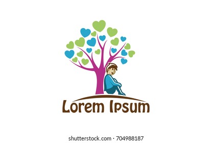 Child resting on a tree with heart-shaped leaves
