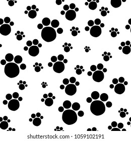 child seamless pattern with paws. Footprints from the paws. Black and White