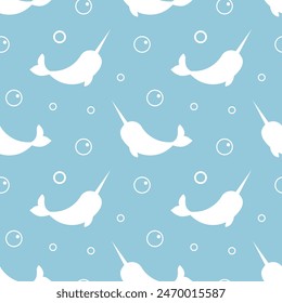 Child  Seamless pattern with white Narwhal and bubbles isolated on light blue background. For textile, fabric, greeting card, invitation.