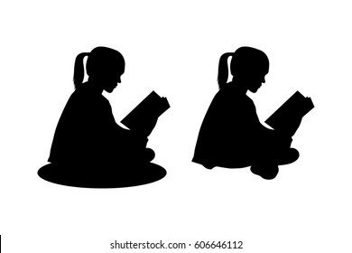 child sitting reading silhouette