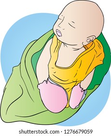 The child was sleeping in the cloth that wrapped him. He is happy and relaxed. He is very cute.