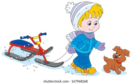 Child with a snow scooter and puppy