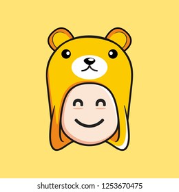 A child uses a cute bear hat