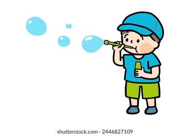 A child wearing a hat blows bubbles.