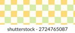 Childish checkered pattern on yellow and green. Fresh spring background. Cute baby seamless print. Pastel color