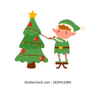 Childish elf decorating Christmas tree vector flat illustration. Adorable fairy tale character hanging garland and baubles on Xmas spruce isolated. Cute Santa helper in holiday costume