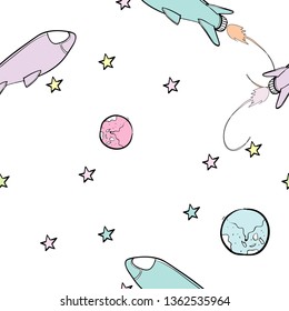 Childish hand drawn elements space, rocket, star, planet in doodle style.for wrapping, poster, web design, kids fabric, textile, nursery wallpaper,seamless pattern