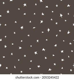 Childish pattern with hand drawn white stars on dark background. Starry kid-like doodle backdrop. Vector illustration for fabric, gift wrap or card.