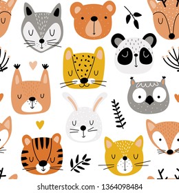 Childish seamless background with cute animals and leafs in scandinavian style. Animal heads cartoon background for baby textile, wrapping paper, wallpaper in vector.